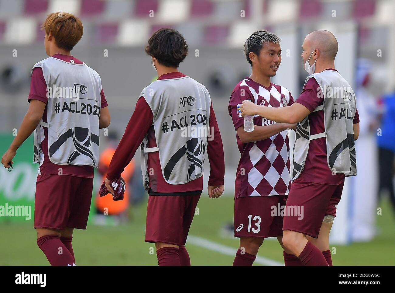 Doha, Qatar. 7th Dec, 2020. Andres Iniesta (1st R) of Vissel Kobe reacts with teammates after winning the round 16 match of the AFC Champions League between Shanghai SIPG FC of China and Vissel Kobe of Japan in Doha, Qatar, Dec. 7, 2020. Credit: Nikku/Xinhua/Alamy Live News Stock Photo