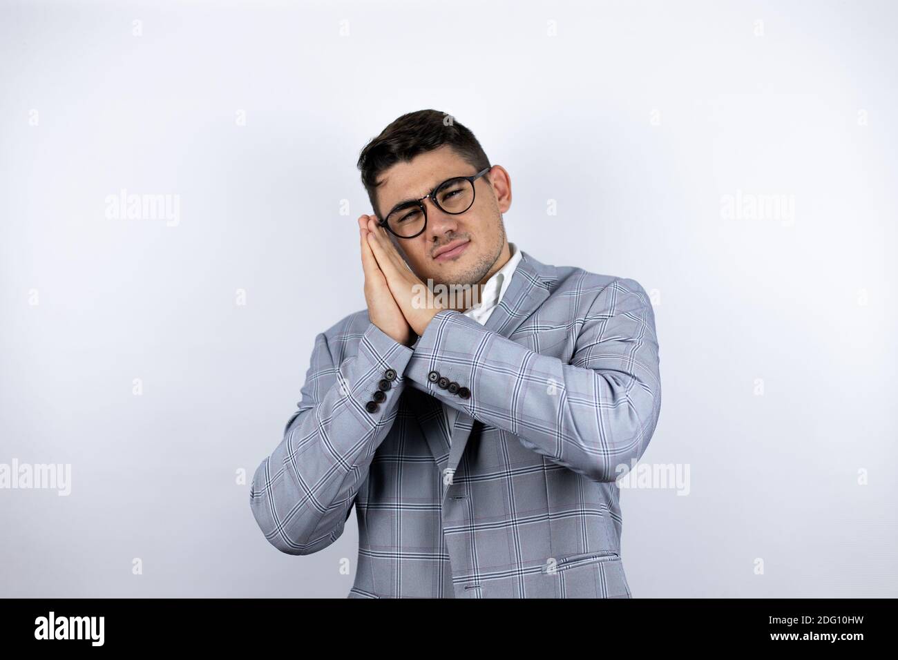 Business young man wearing a casual shirt over white background ...