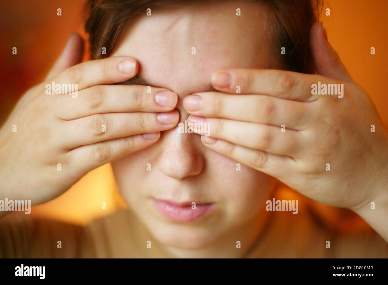 Hands on eyes Stock Photo