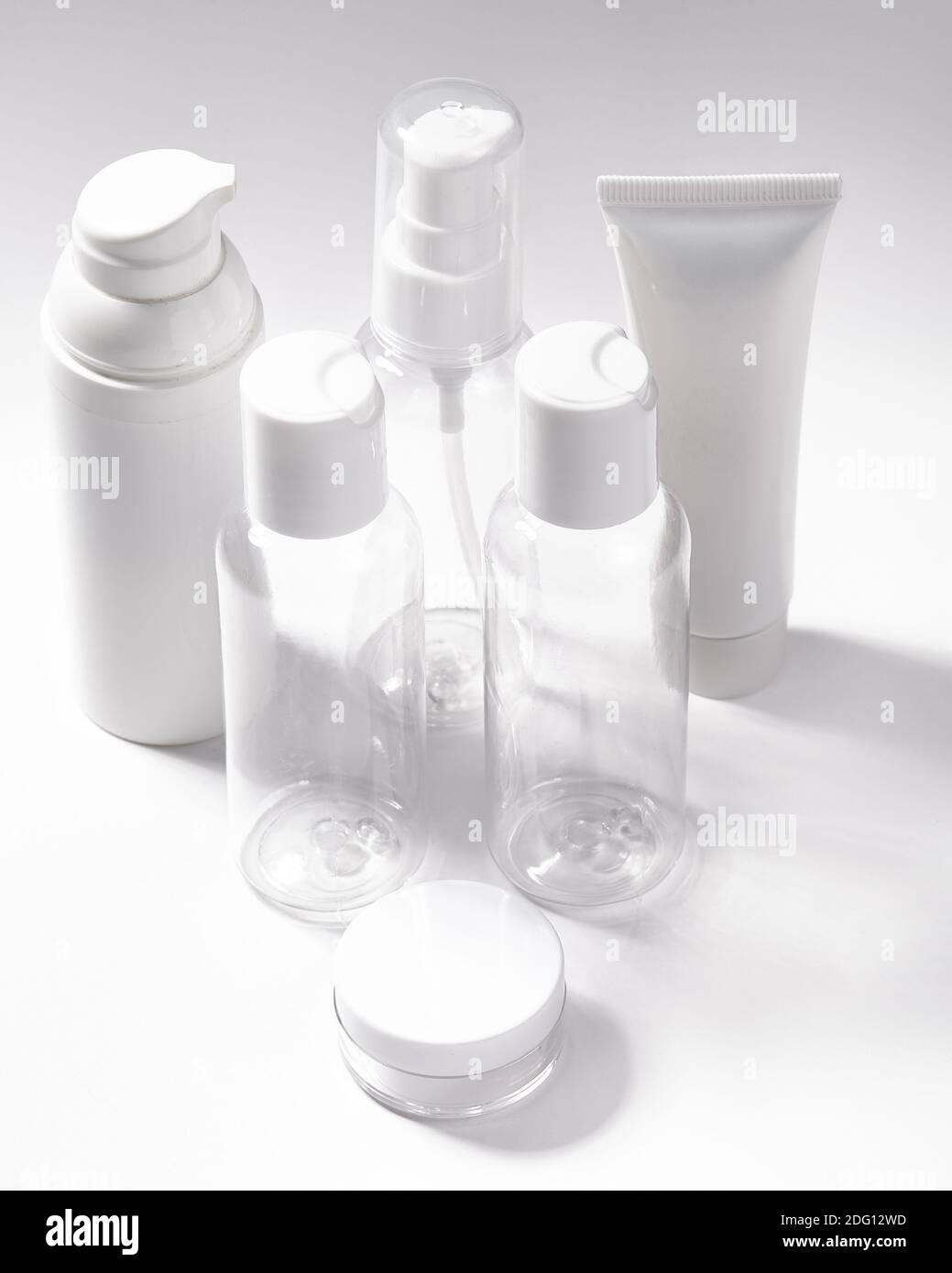 White cosmetic bottles on white background. Wellness, spa and body care bottles collection. Beauty treatment, bathroom set Stock Photo