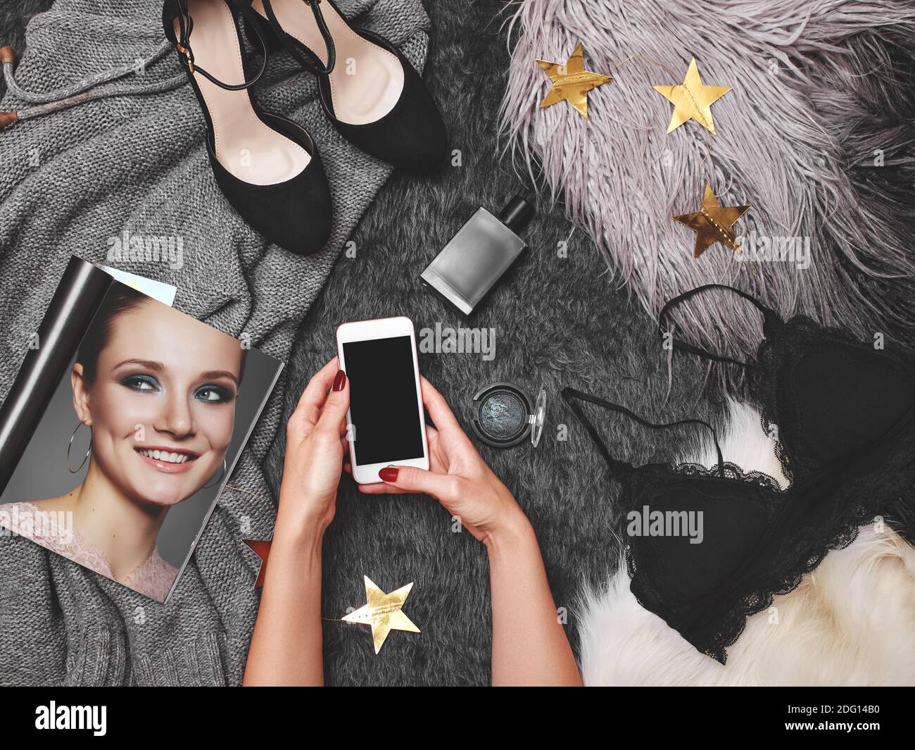 Female Hands using Mobile on Fashion Background. Woman Customer Shopper