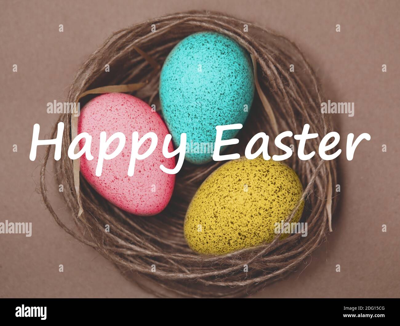 Easter card. Painted Easter Eggs in Nest on brown Background. Spring ...