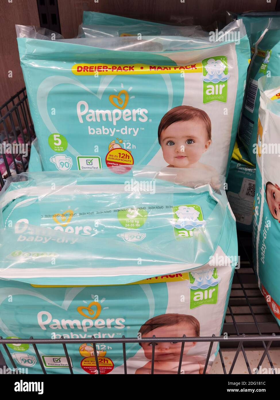 Berlin, Germany December 7, 2020 View of a shelf with packages of diapers in a supermarket