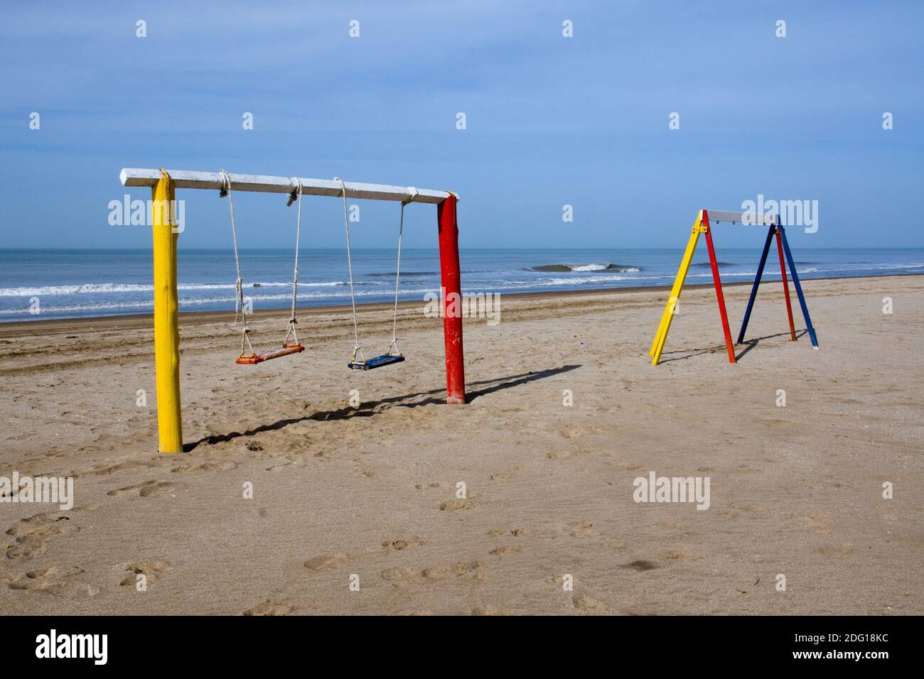 Swings at the beach Stock Photo Alamy