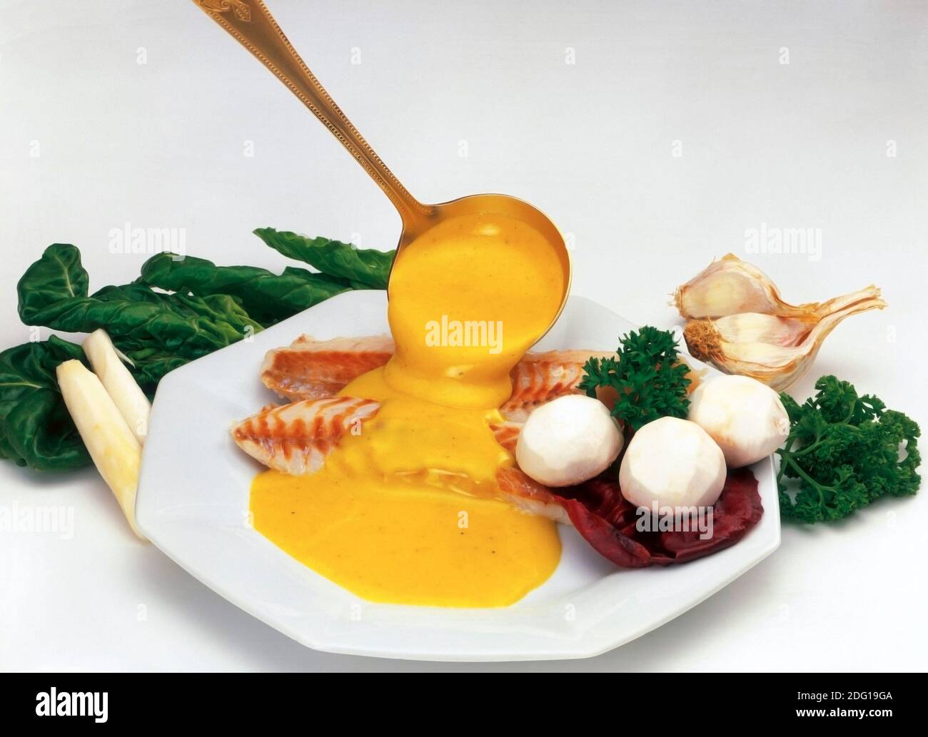 Fish with sauce Stock Photo Alamy