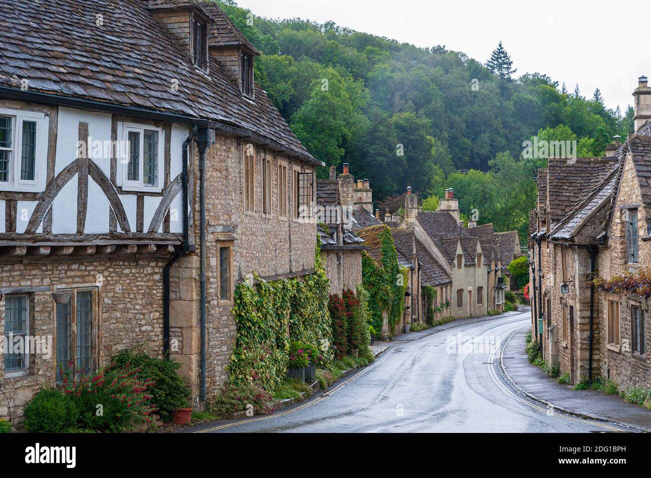 Step back in time and visit Castle Combe, quaint village with well preserved masonry houses dated centuries back in Wiltshire in England. Stock Photo