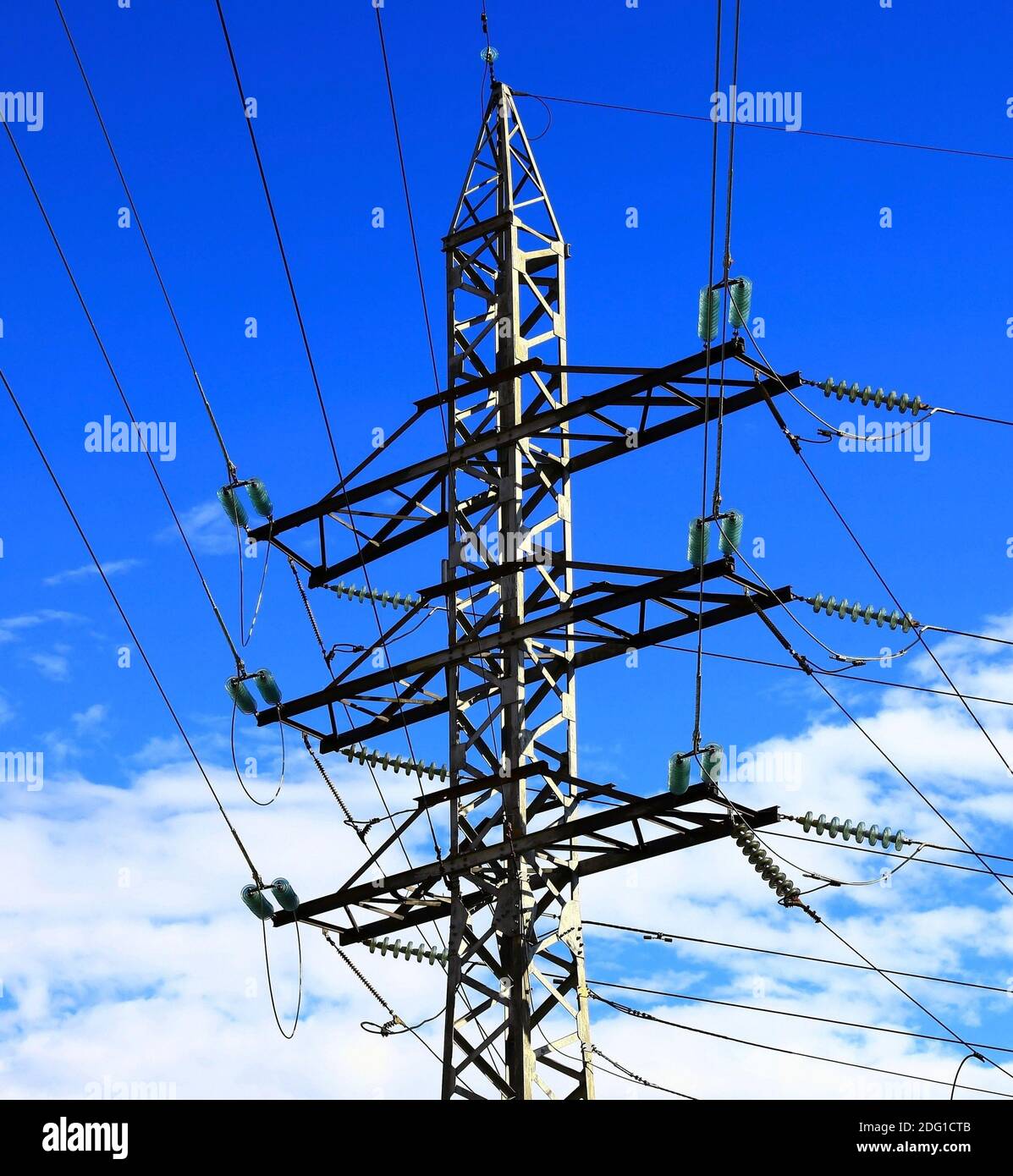 Electricity pylon against cloudy sky. Day. Nobody Stock Photo - Alamy