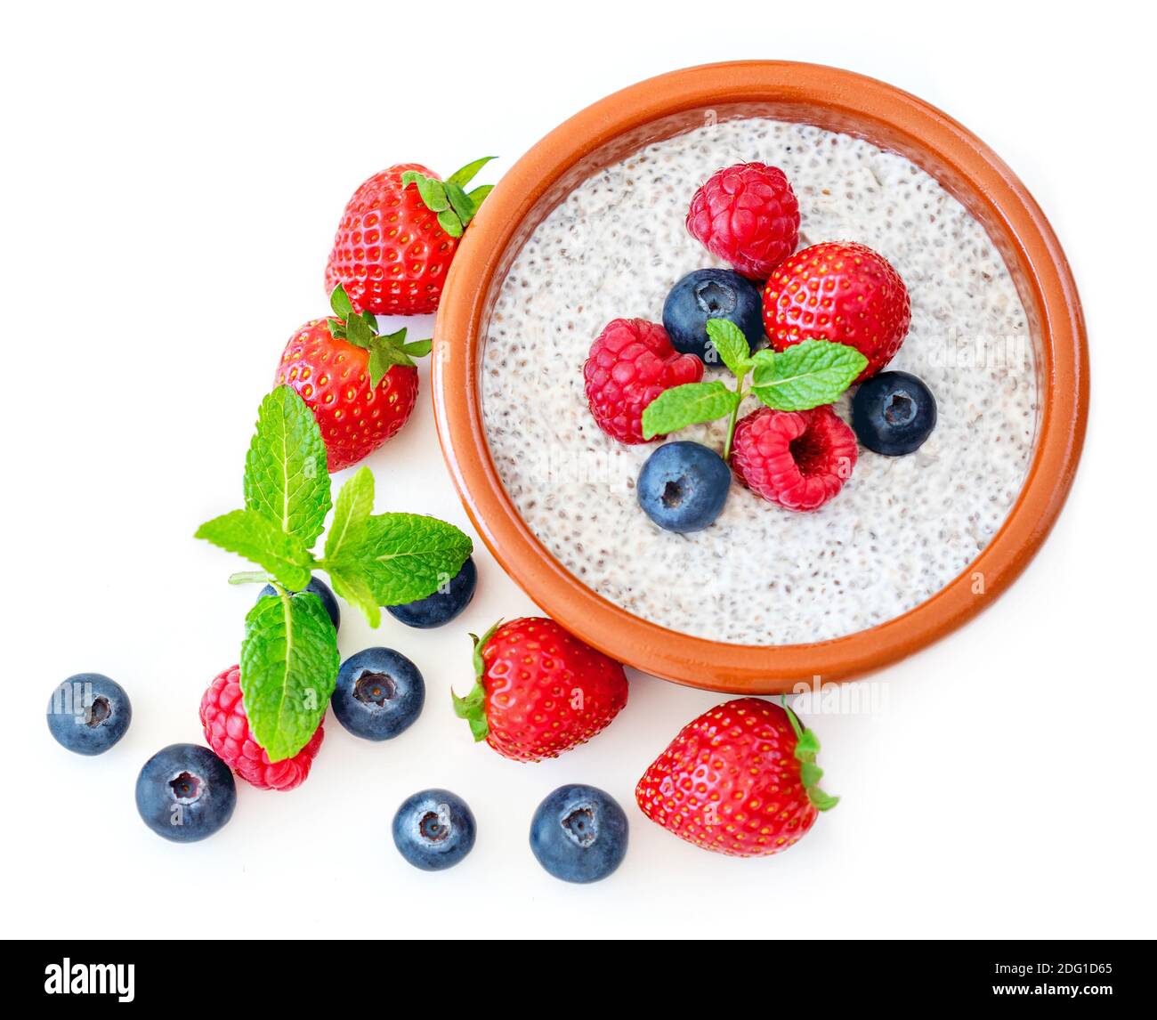Chia seed pudding with fruits and berries isolated on white background