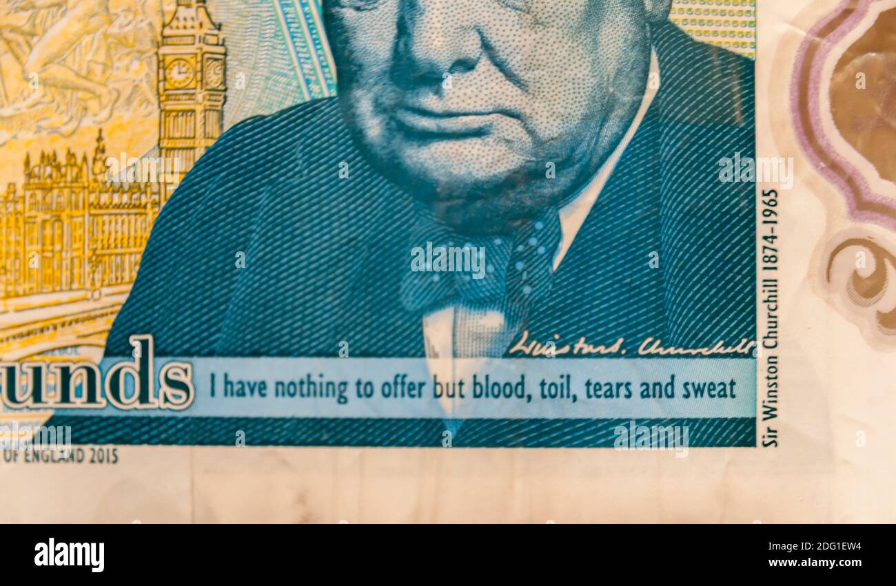 British Five pound notes macro shot on Sir Winston Churchill, quote. ‘I have nothing to offer but blood, toil, tears and sweat’ Stock Photo