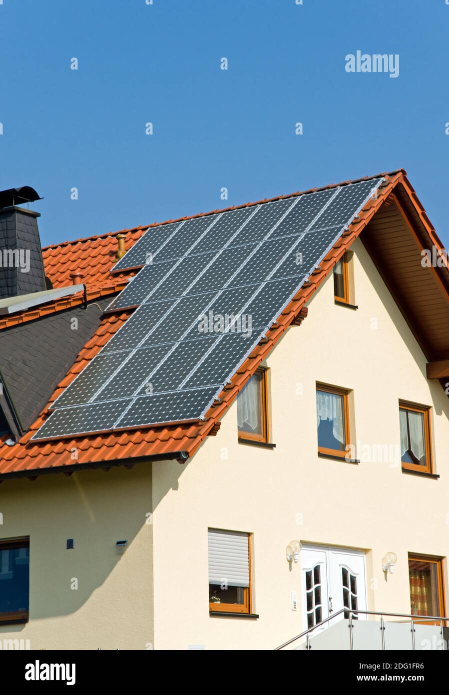 Roof with solar panels in Germany Stock Photo