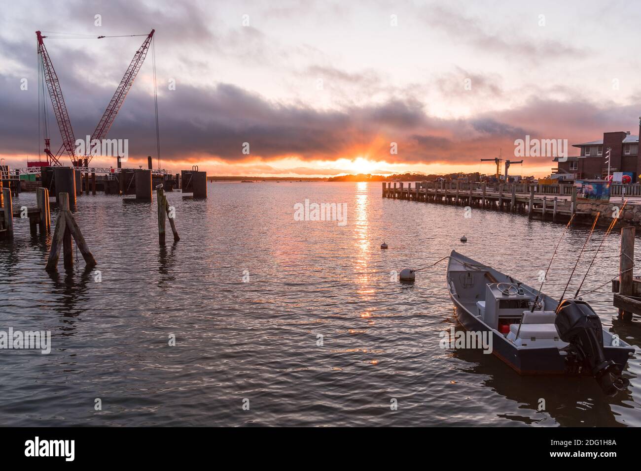 Majestic sunset over a harbour in autumn Stock Photo