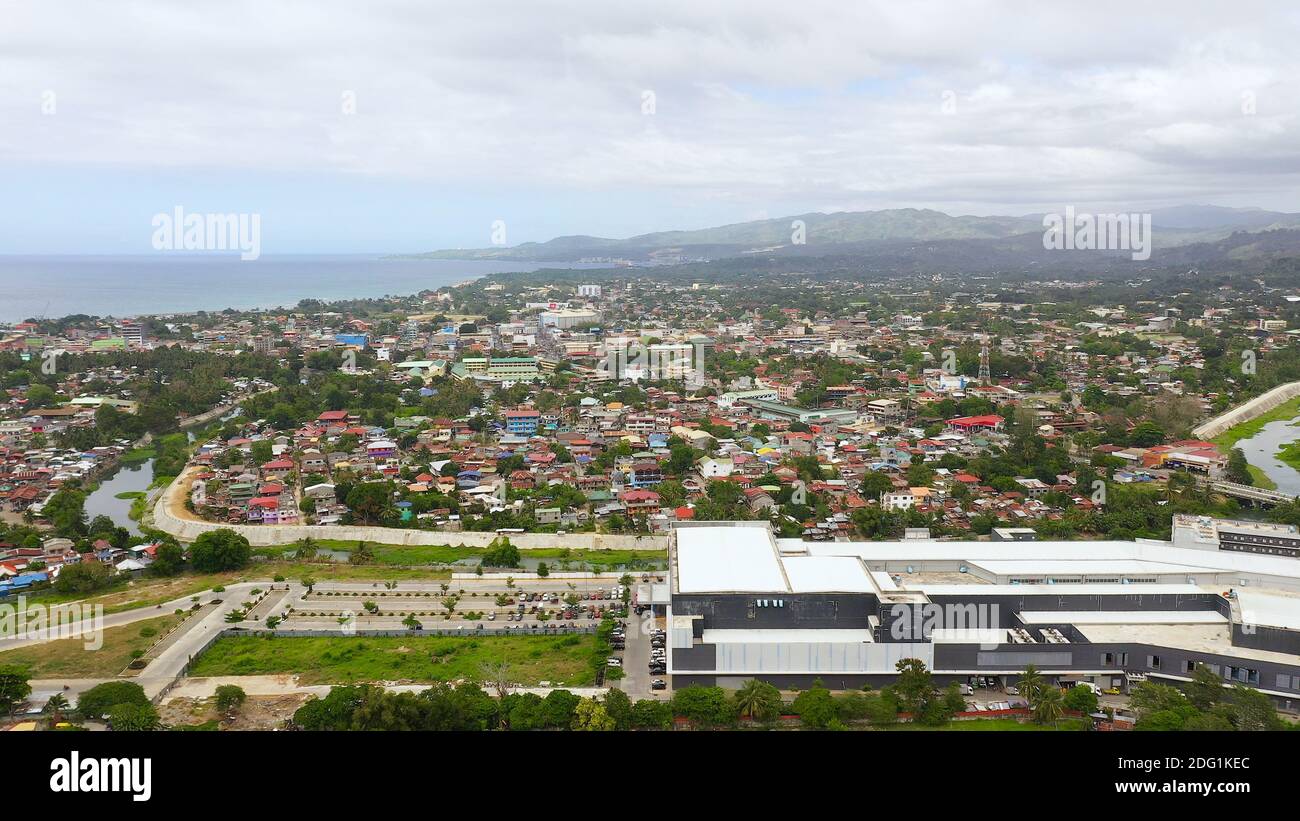 Top view of Iligan on Mindanao island, Philippines. A developing and modern city in Asia. Iligan Top view of Iligan on Mindanao island, Philippines. A developing and modern city in Asia. Iligan