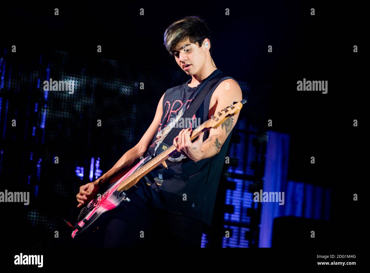 Calum Hood, of the Australian pop-rock band 5 Seconds Of Summer performing live for the “Rock Out with Your Socks Out Tour” at the Pala Alpitour in Torino, Italy Stock Photo