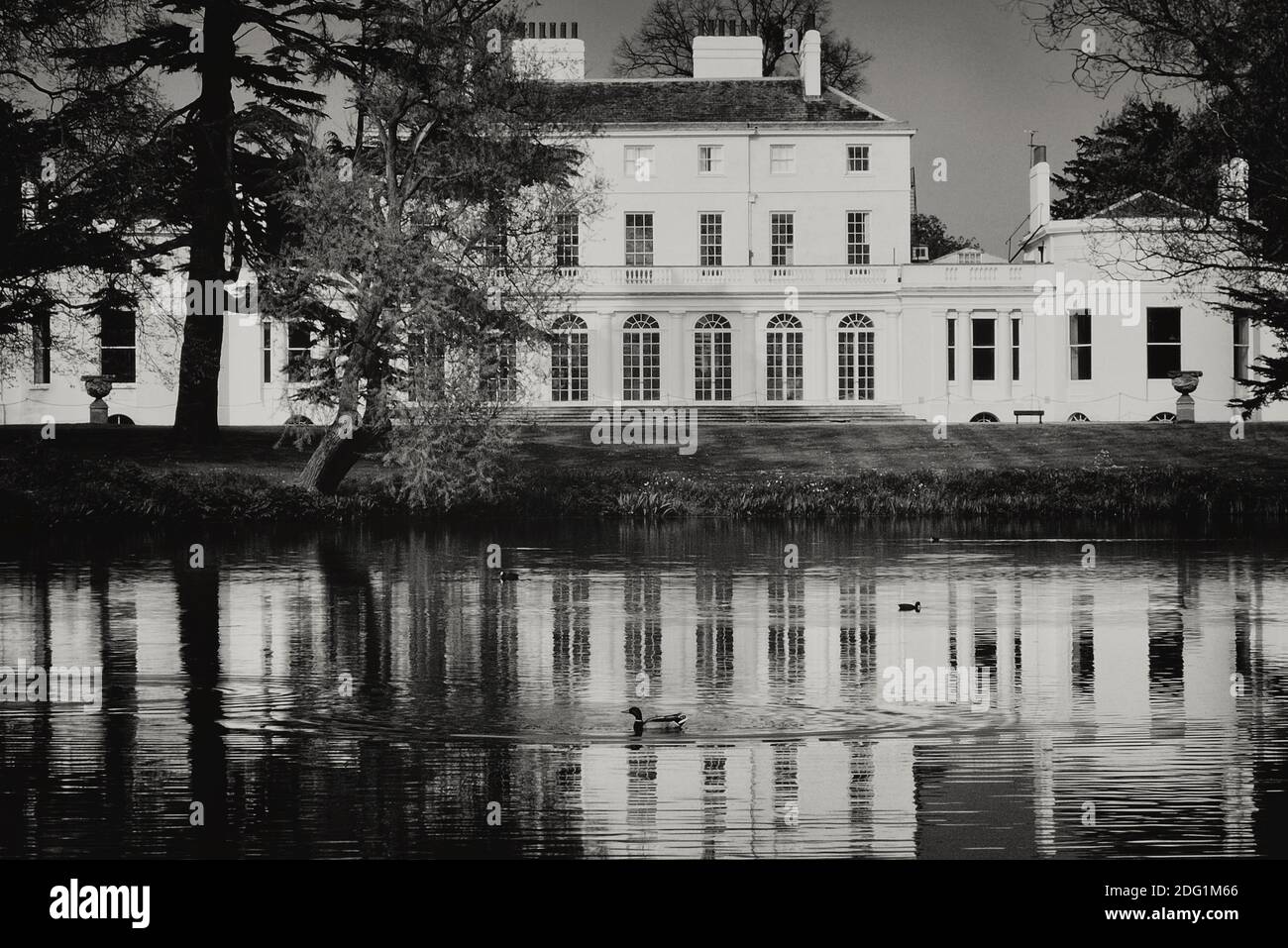 Frogmore House viewed across the lake, Windsor. Berkshire. England. UK Stock Photo