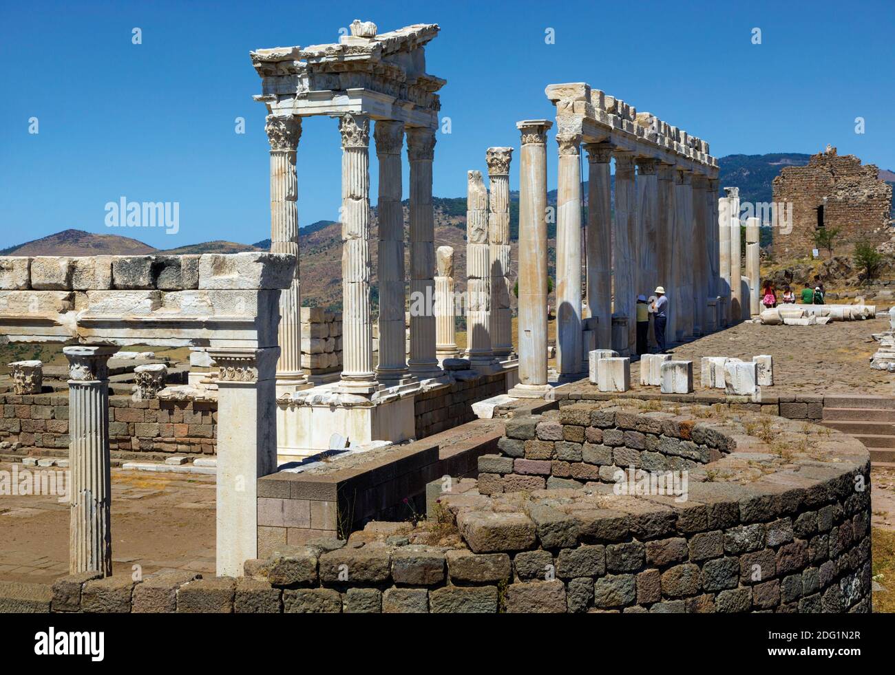 Ruins of ancient Pergamum above Bergama, Izmir Province, Turkey. The Temple of Trajan, completed in the 2nd century AD. The ruins are a UNESCO World H Stock Photo