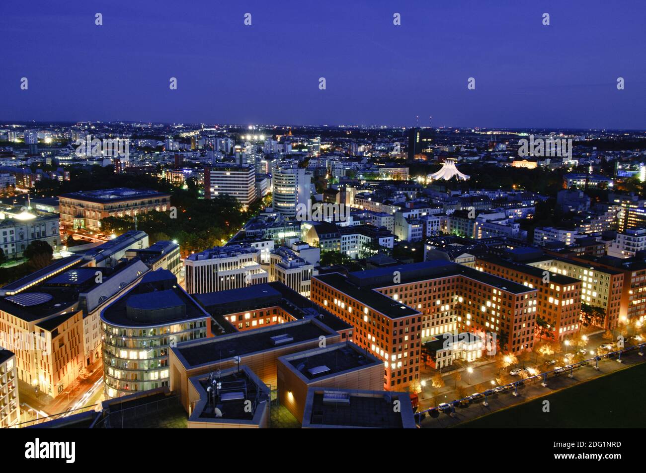 An aerial view of city lights at night on a dark sky background Stock ...
