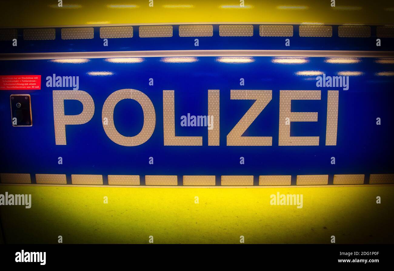 German Polizei Sign In White Letters On A Police Car Stock Photo
