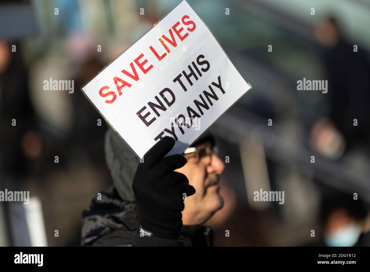Anti-lockdown protest in Stratford, London, 5 December 2020. Close-up view of a protester's placard. Stock Photo