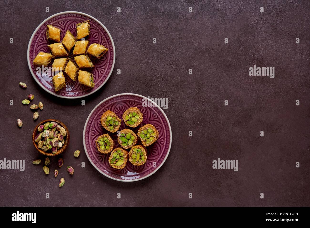 Traditional turkish, arabic sweets baklava assortment with pistachio. Top view, copy space Stock Photo