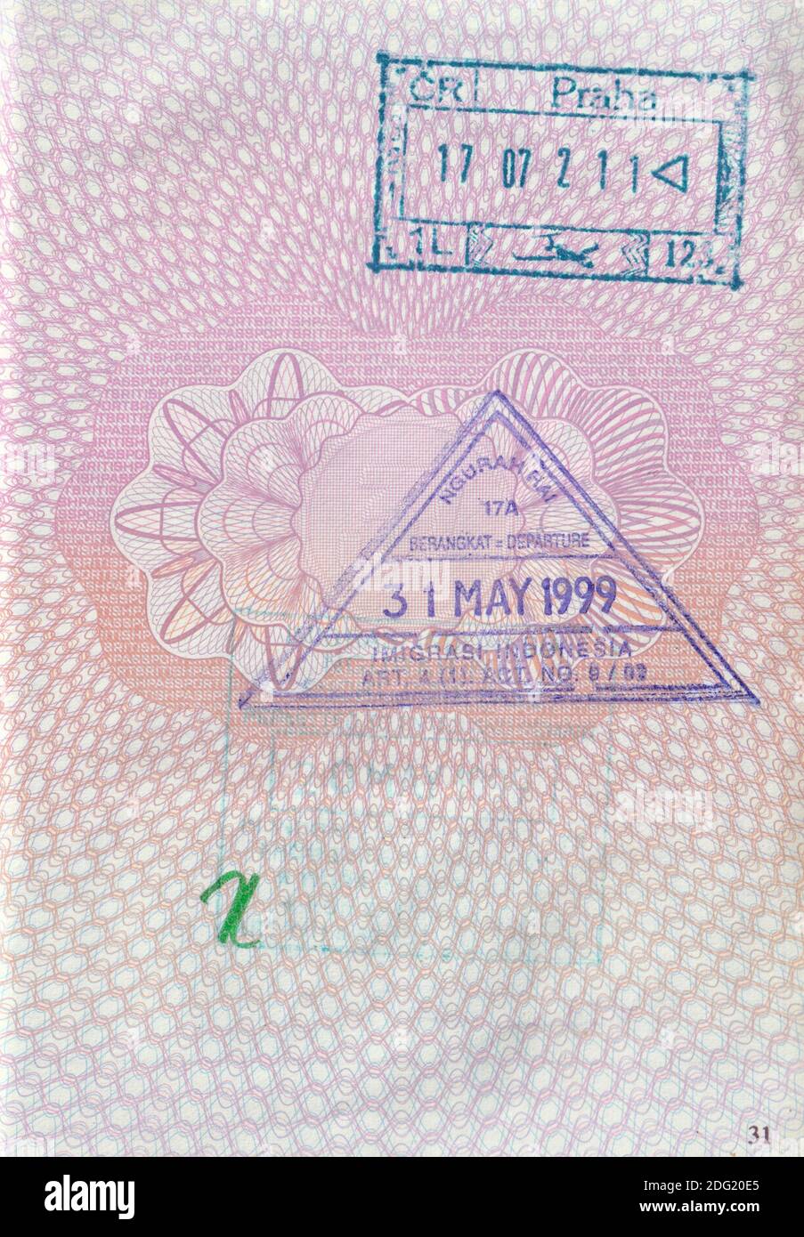 UK passport page with 1999 Indonesia entry/exit stamp and 2002 Czech Republic stamp (Prague Airport) Stock Photo