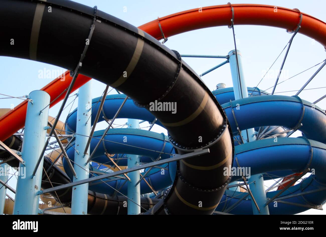Twisting, colorful water chutes wind around Stock Photo Alamy