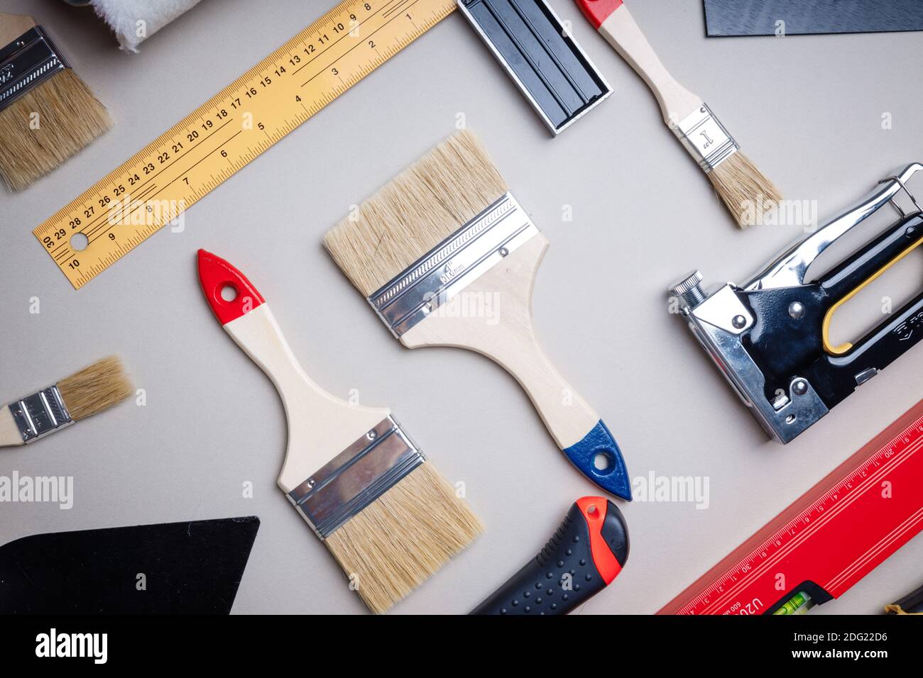 Construction tools for work and repair. Ruler, brush, spatula Stock