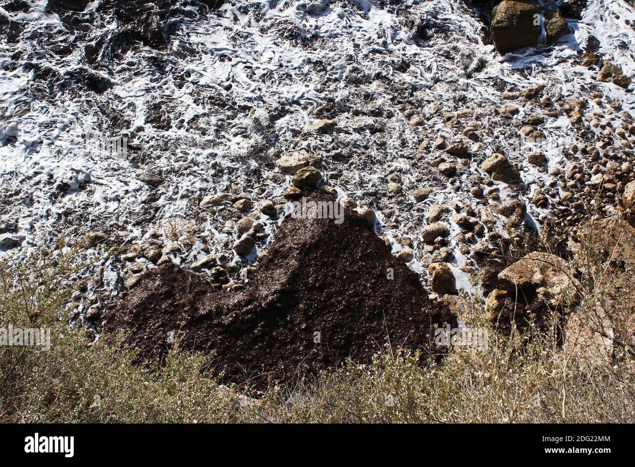 Water Splashing Against Rocks Stock Photo - Alamy
