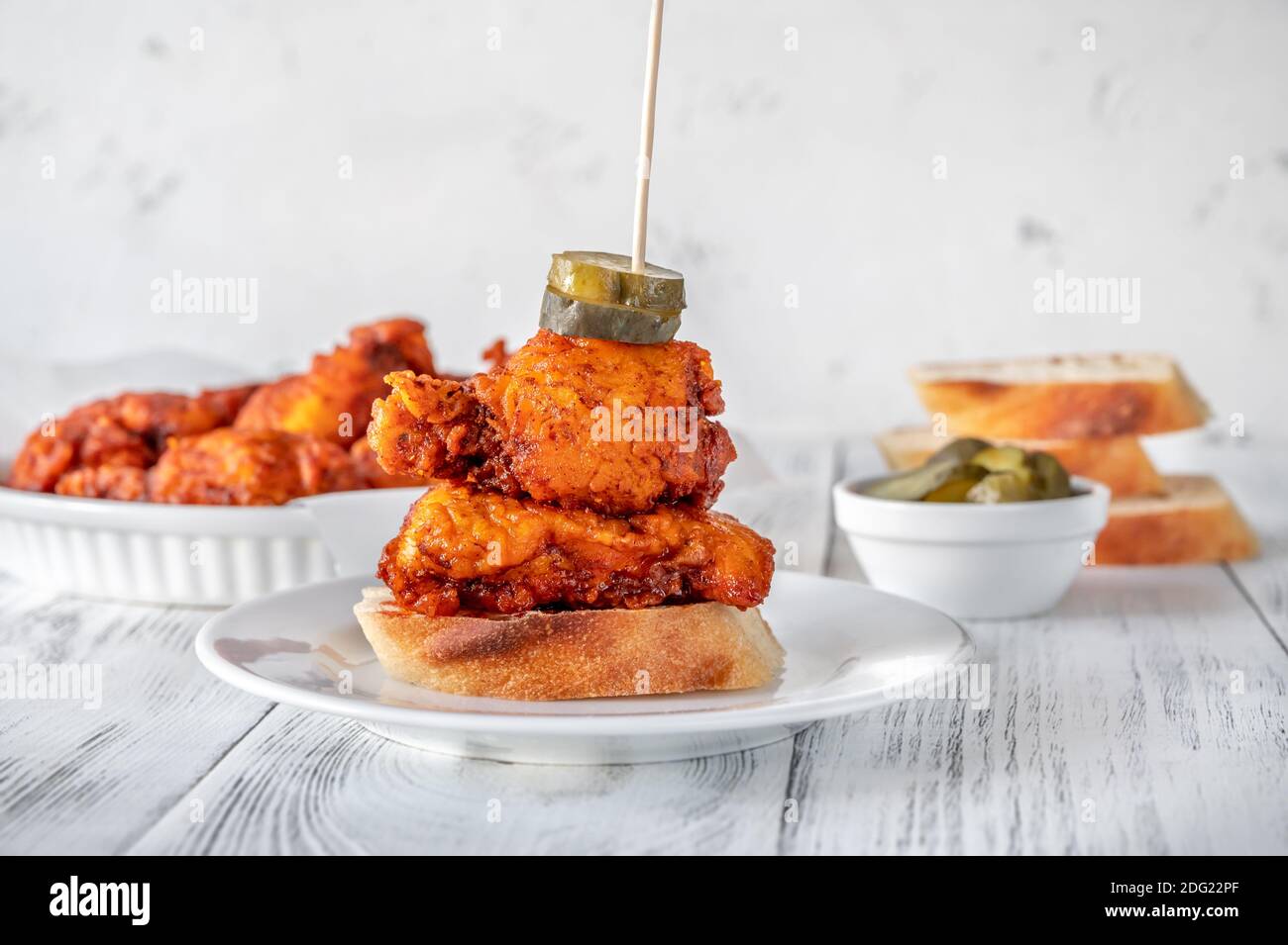 Nashville Hot Chicken covered in cayenne pepper sauce Stock Photo Alamy