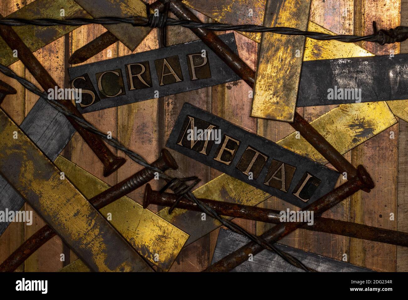 Scrap Metal text with barbed wire on grunge textured bronze copper and