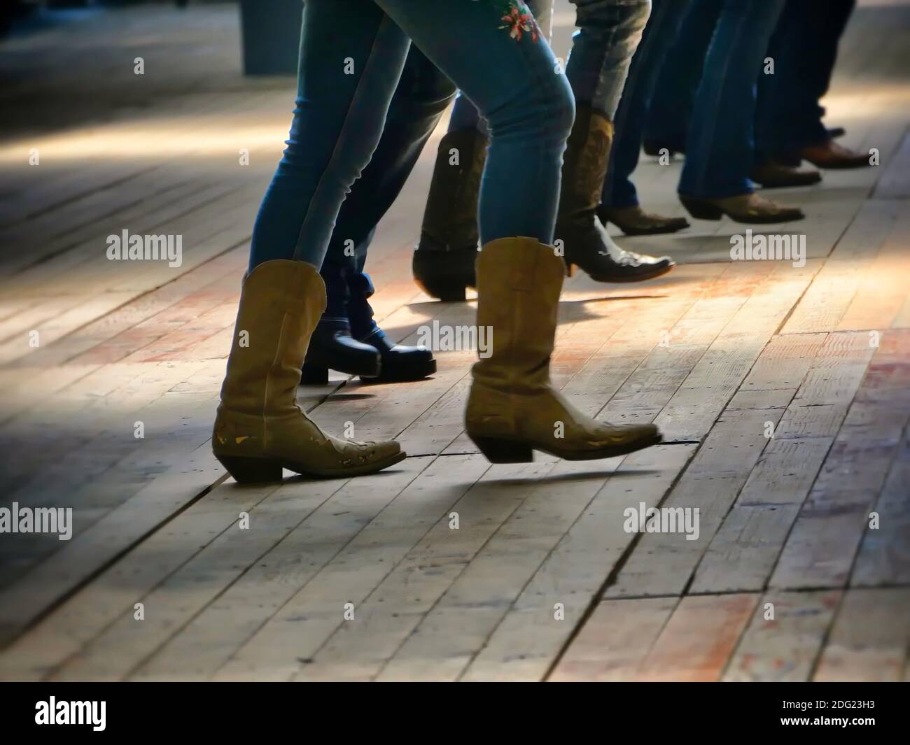Traditional western folk music dancer's legs in cowboy boots dancing on