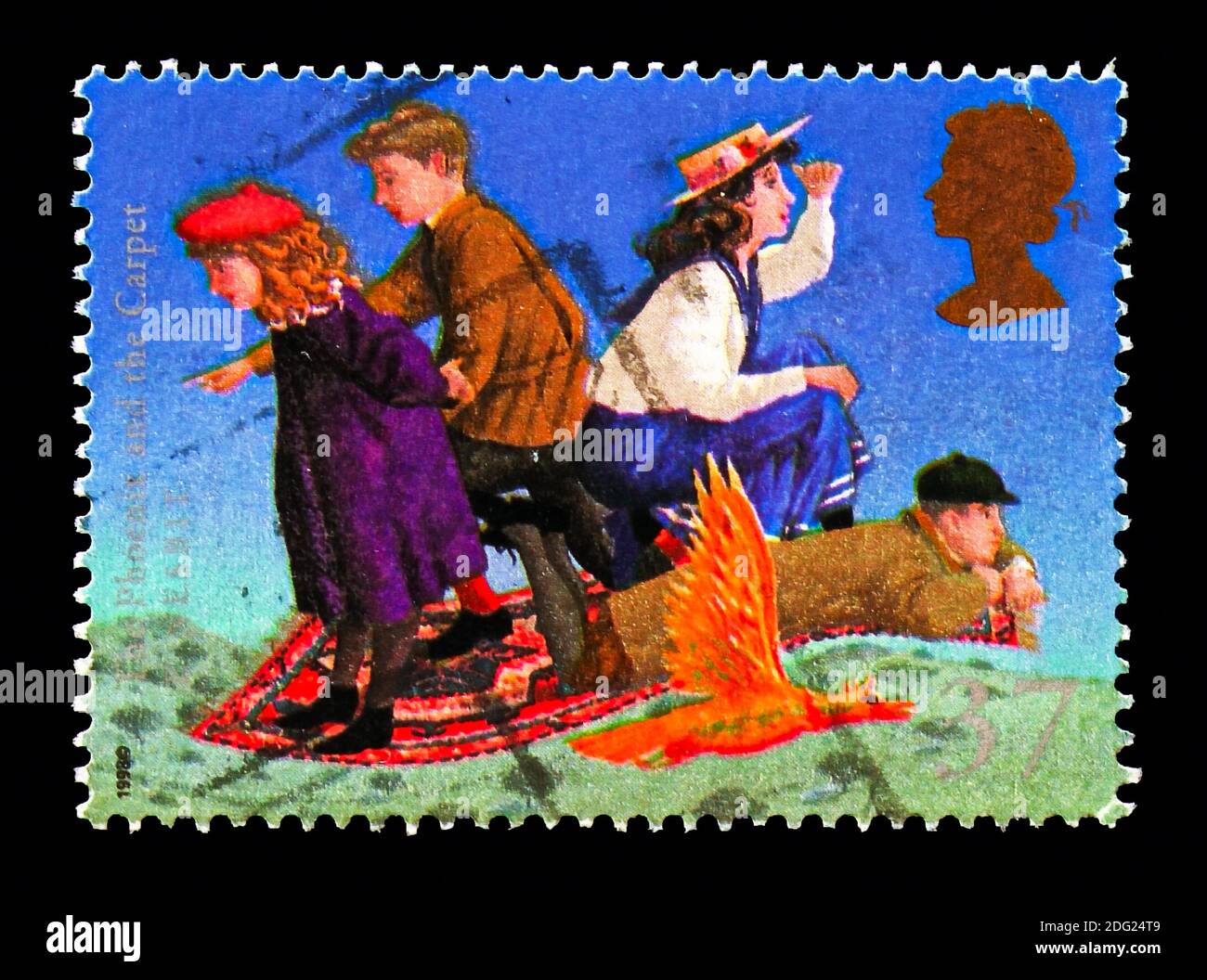 MOSCOW, RUSSIA - AUGUST 18, 2018: A stamp printed in Great Britain shows The Phoenix and the Carpet (E. Nesbit), Famous Children's Fantasy Novels seri Stock Photo