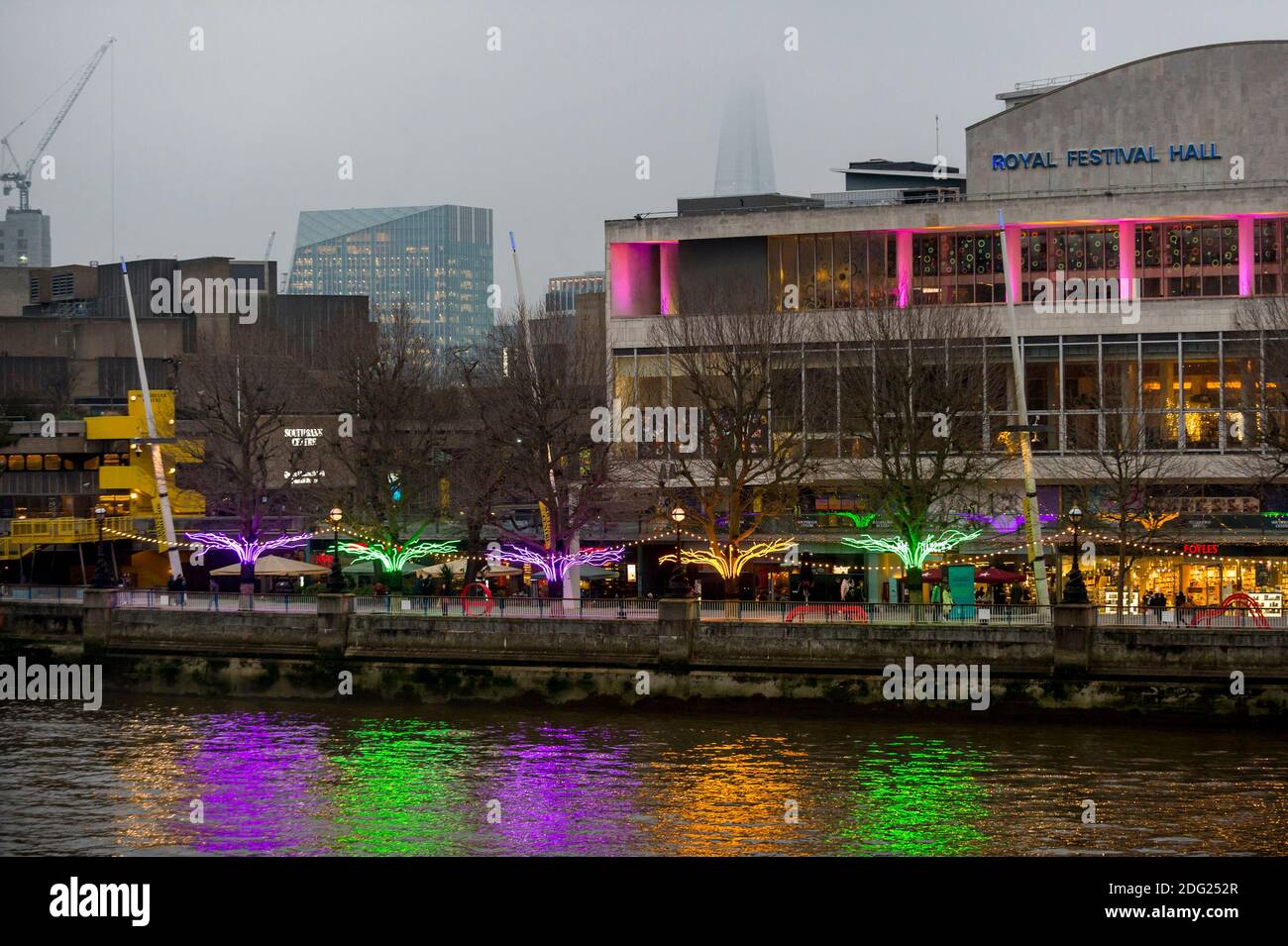 London, UK.  7 December 2020. Illuminations on show during the preview of “Winter Light” presented by Southbank Centre, including 'Lumen' by David Ogle, trees illuminated with glowing neon flex.  Over 15 artworks and new illuminated commissions by a range of leading international artists are on display around the site’s buildings and the Riverside Walk until the end of February 2021. Credit: Stephen Chung / Alamy Live News Stock Photo