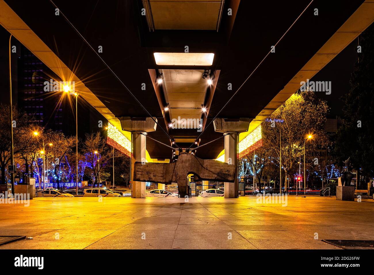 Madrid, Spain - December 6, 2020: Museum of Sculptures in La Castellana under Juan Bravo Bridge illuminated at Christmas Stock Photo