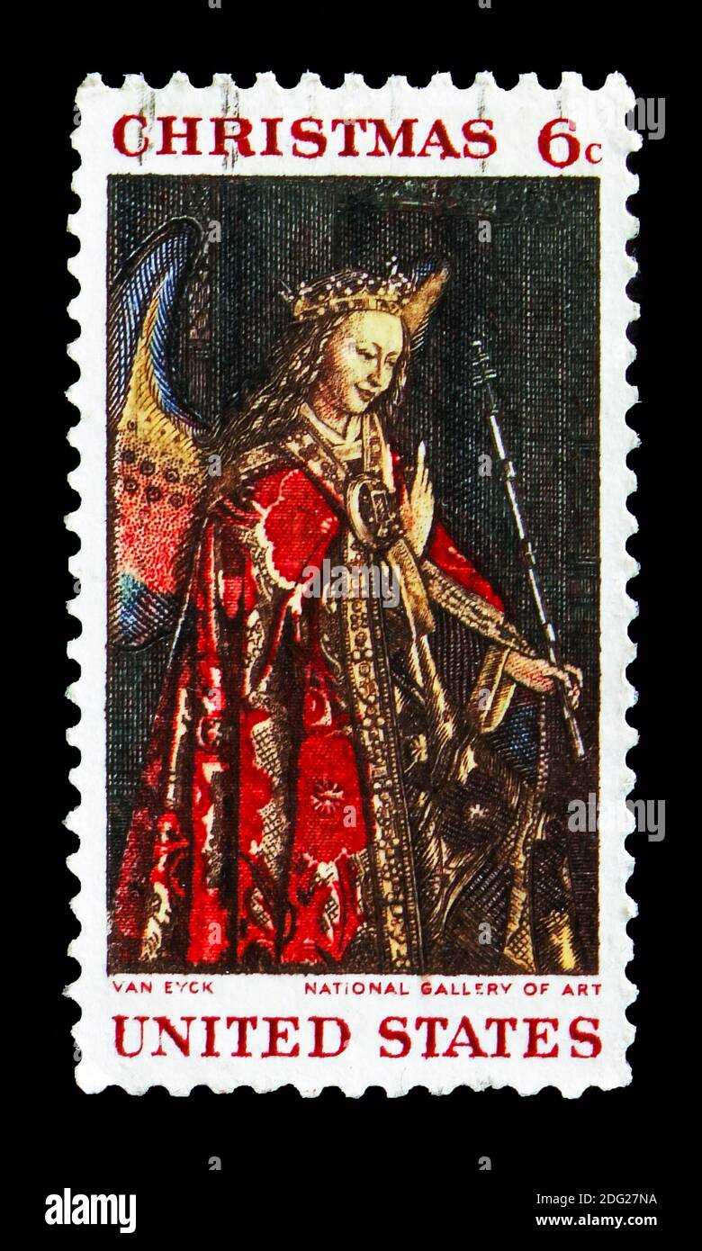 MOSCOW, RUSSIA - AUGUST 18, 2018: A stamp printed in USA shows Angel Gabriel, from 'The Annunciation' by Jan van Eyck, Christmas serie, circa 1968 Stock Photo