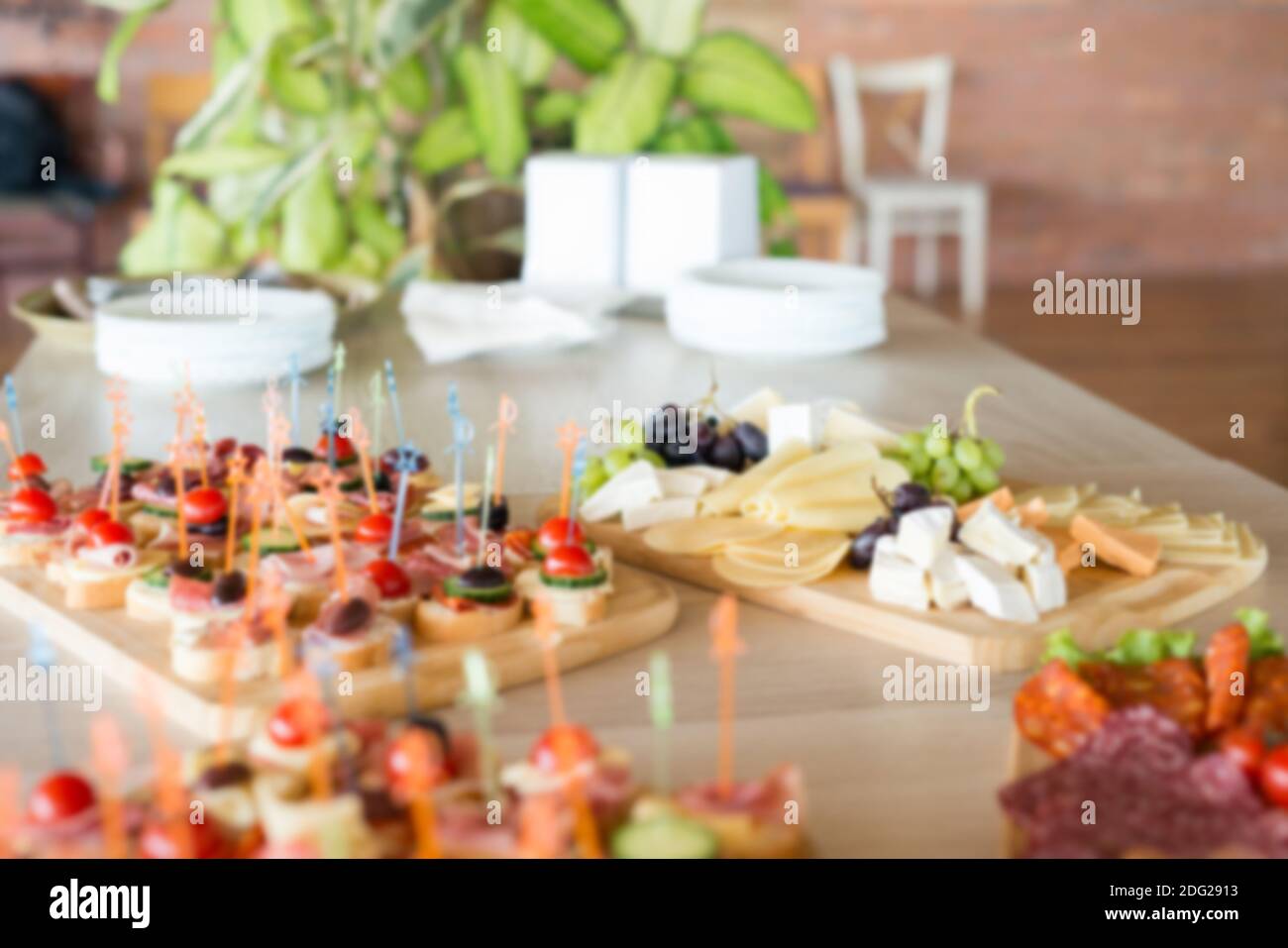 Abstract blurred image of dining table set for party, dinner or