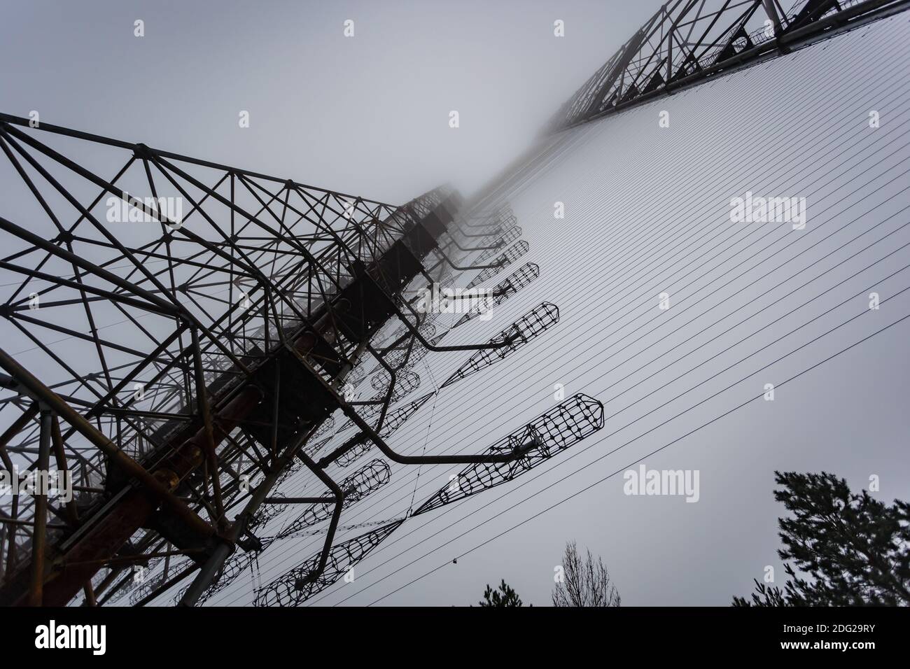 Soviet radar Duga in foggy weather. Russian woodpecker - over-the ...