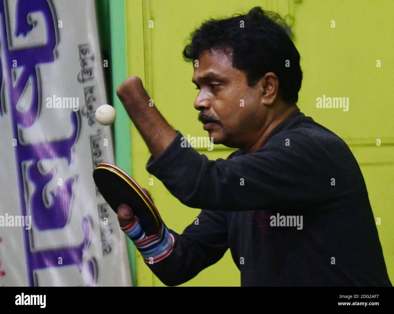 Kajol Dey, a 49 year old disabled table tennis player and coach is seen