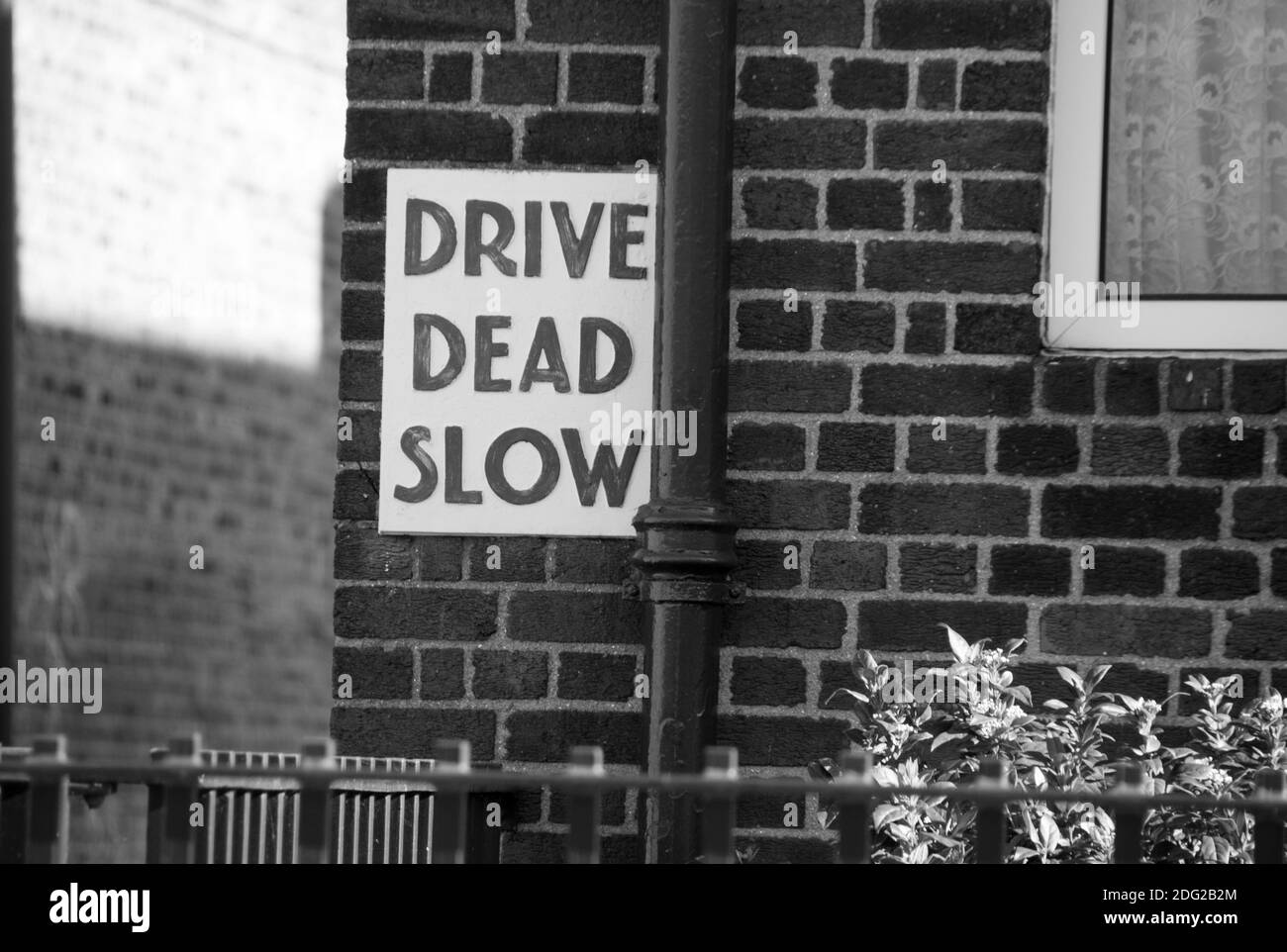 Drive Dead Slow Sign Stock Photo