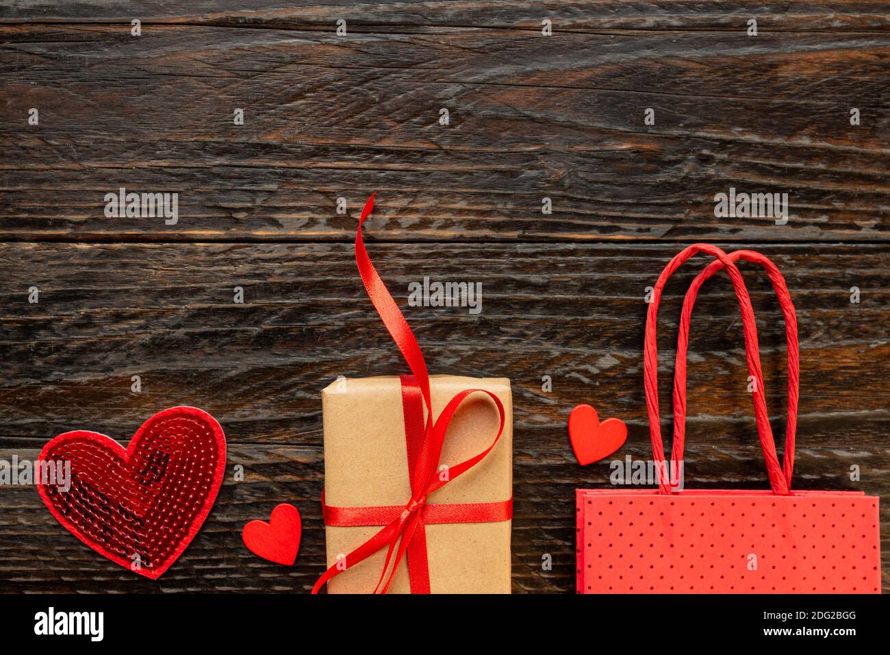 Paper craft Gift box with red ribbon bow, paper bag and red hearts ...