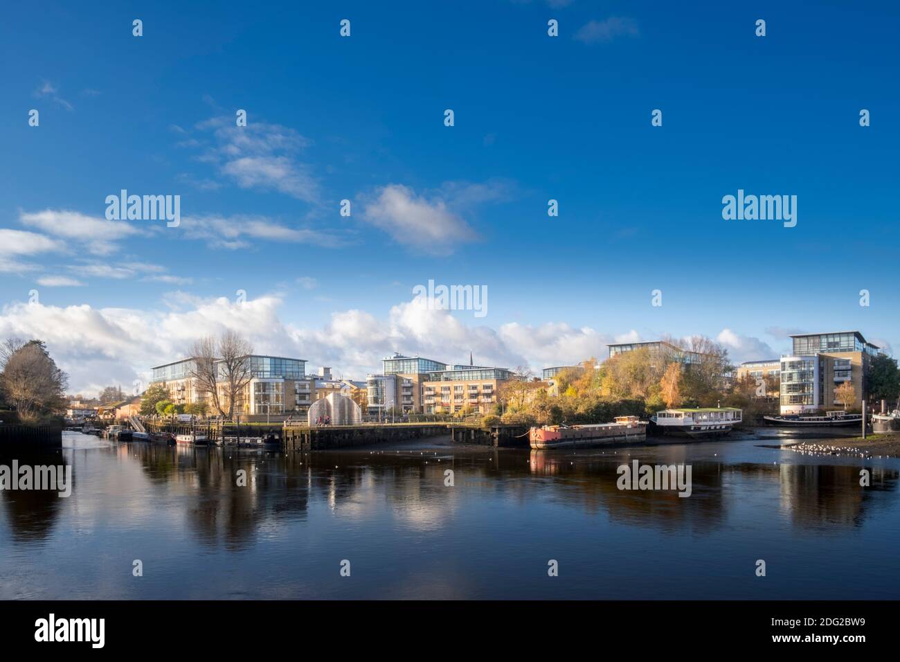 London, Hounslow, Brentford, Brentford Dock & mooring basin, mouth of the River Brent at the confluence of Thames, residential & commercial buildings Stock Photo