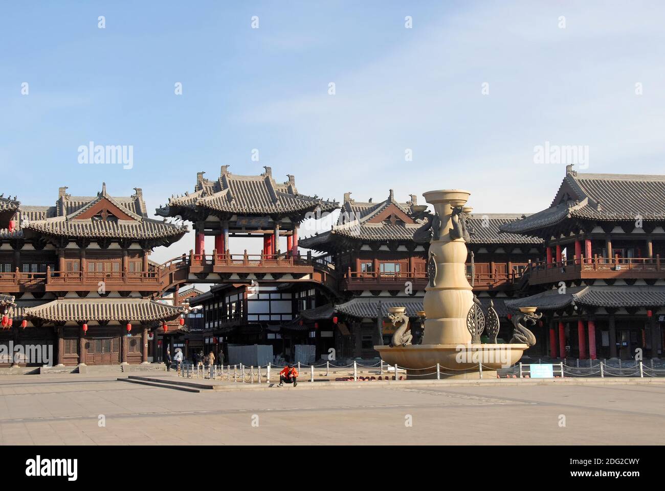 Datong, Shanxi Province in China. Hongqi Square in central Datong. An open area with stores designed in a traditional style. Stock Photo