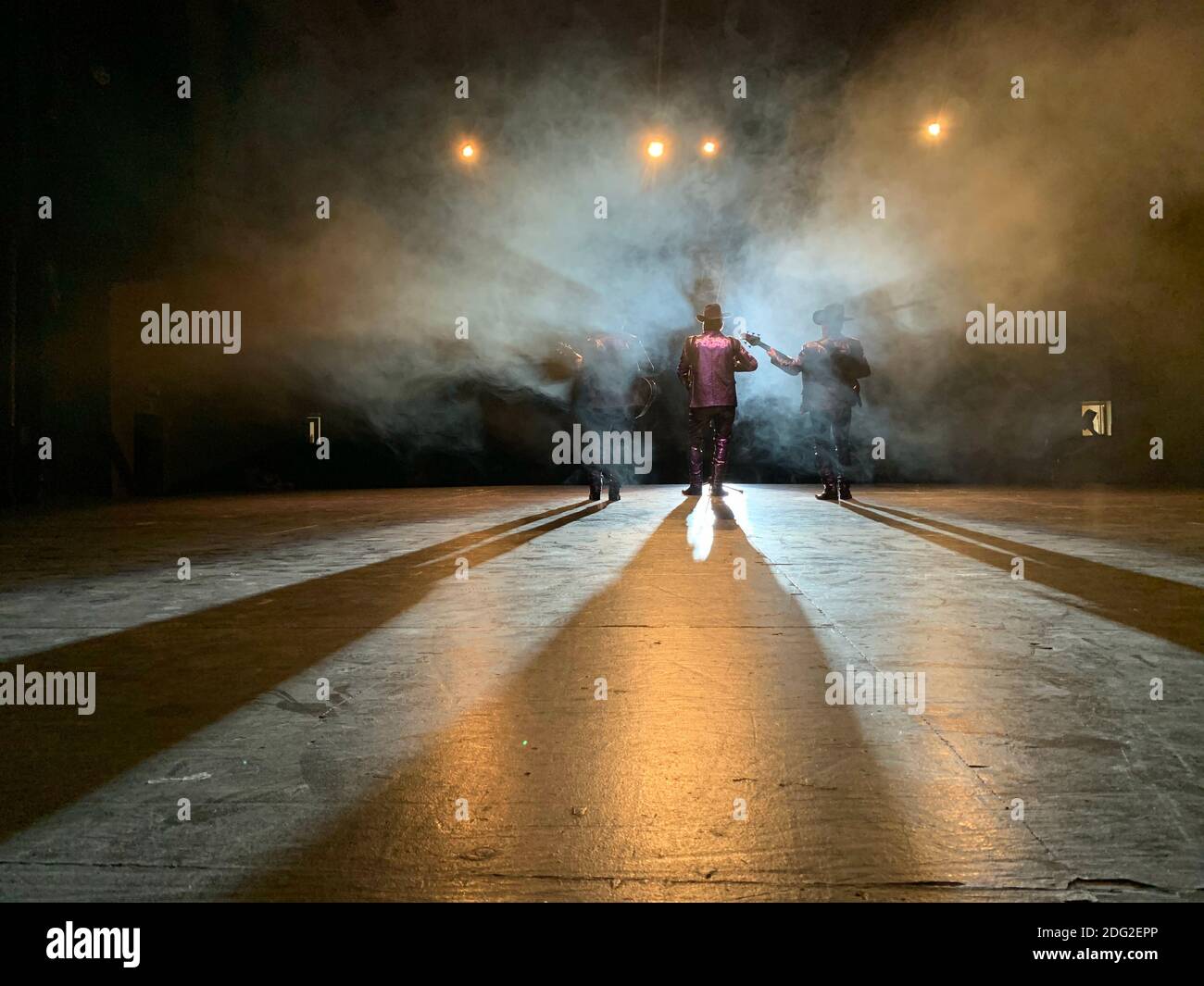 Sierreño Genre Example Musical production, recording of music video clip of a group from the ...