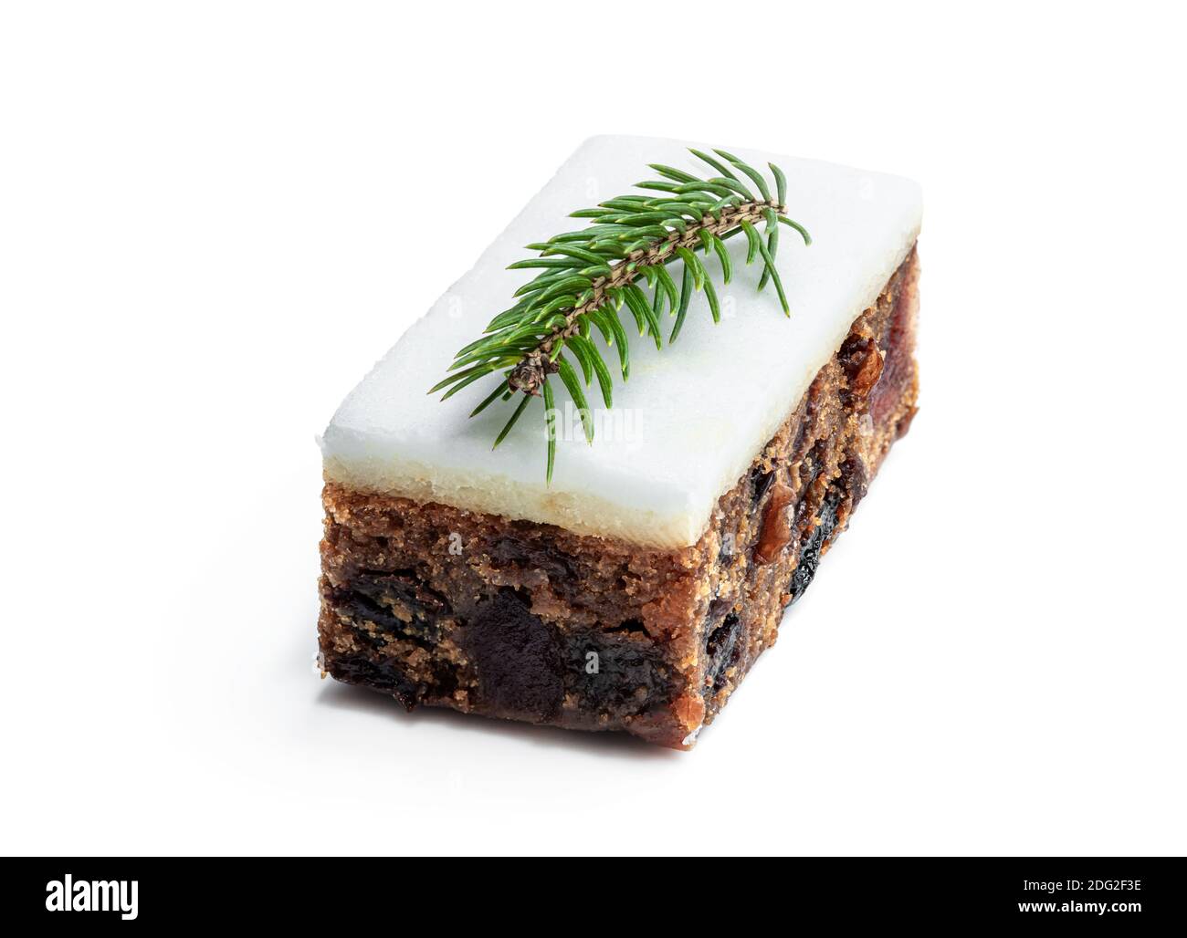 Fruit  cake slice topped with marzipan isolated on white Stock Photo