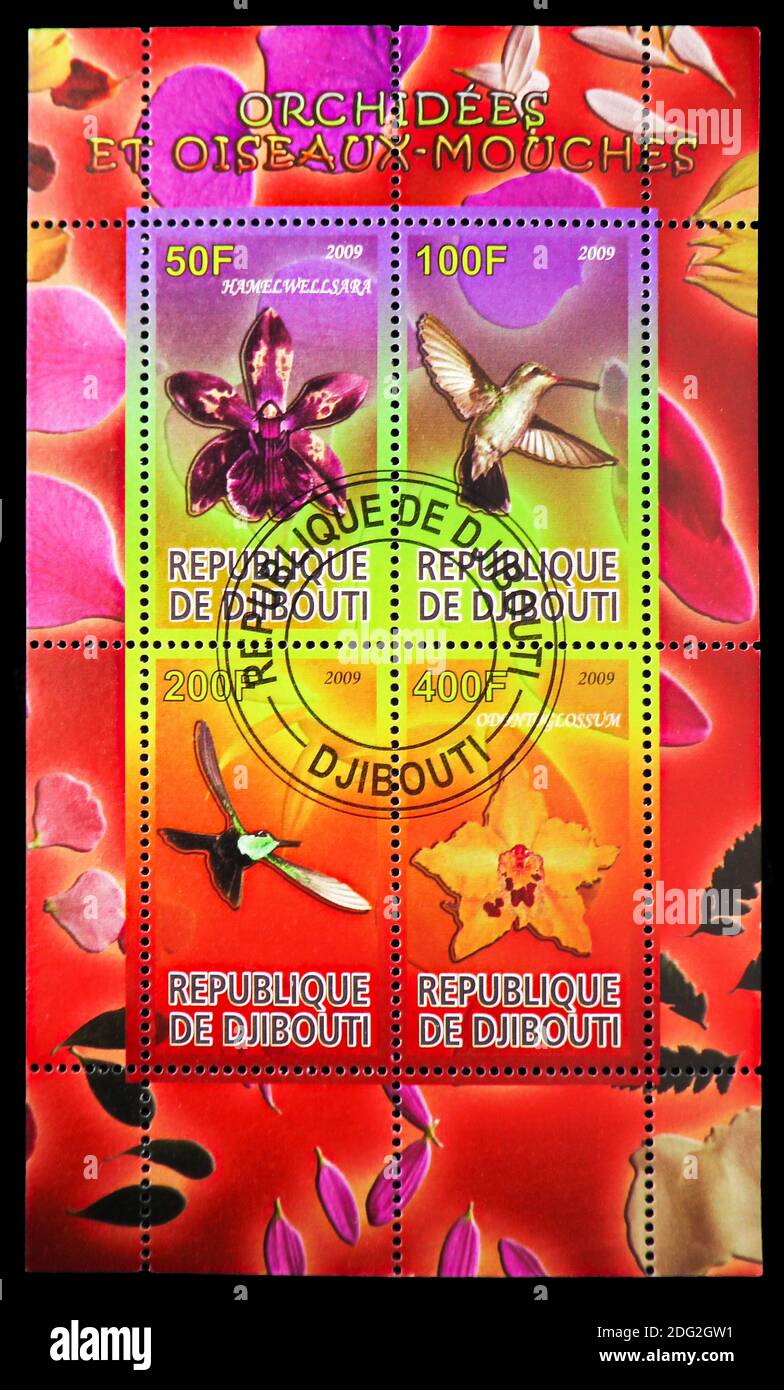 MOSCOW, RUSSIA - OCTOBER 21, 2018: A stamp printed in shows block of Orchids and Hummingbirds serie, circa 2009 Stock Photo