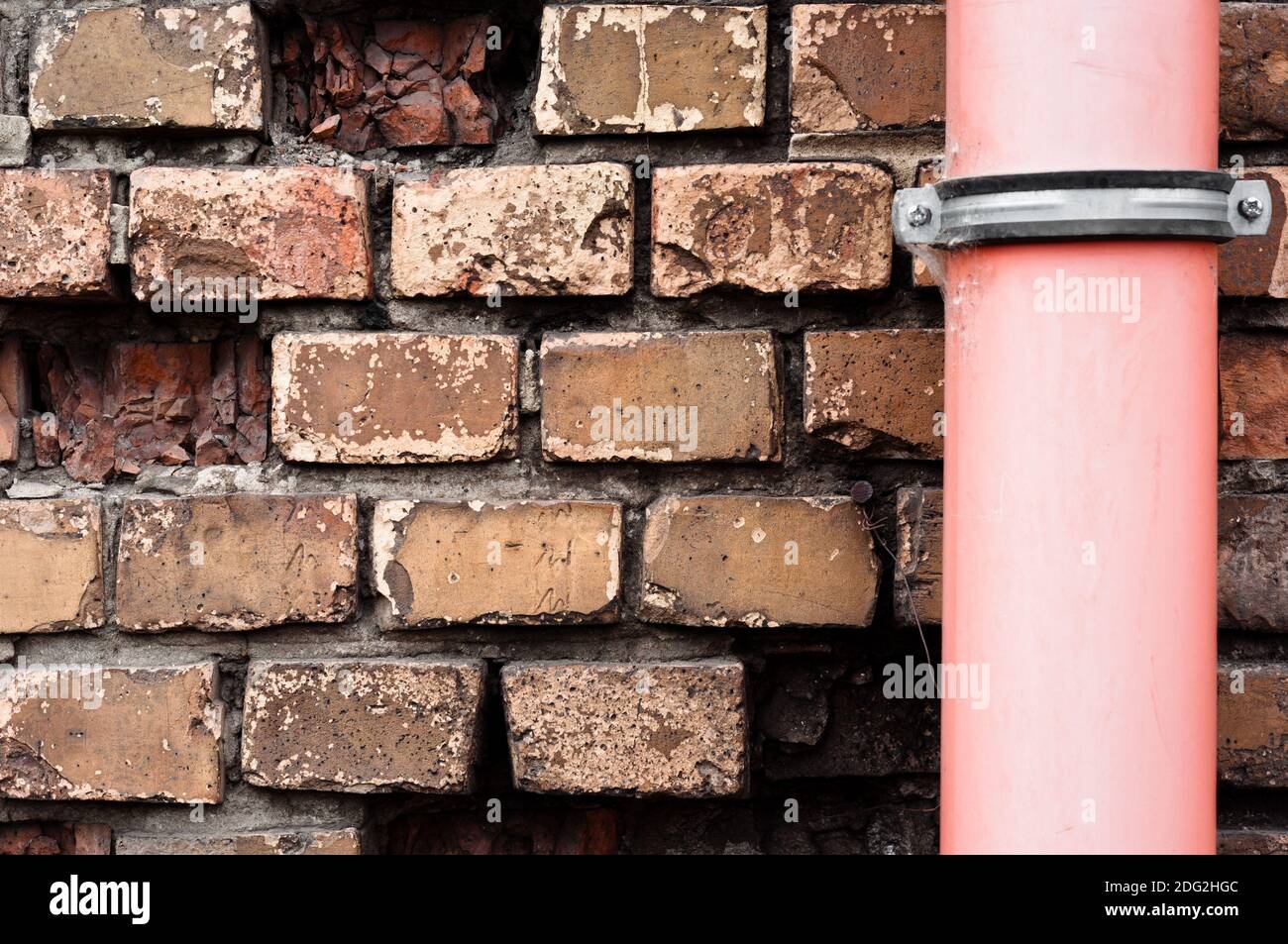 Drain pipe against brick wall Stock Photo Alamy