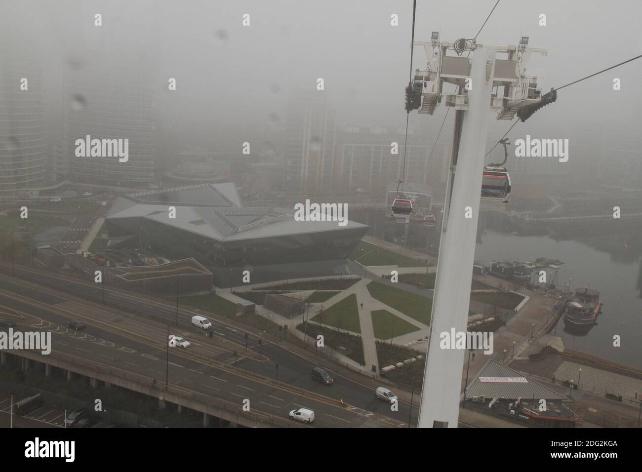 London, UK. 7th Dec, 2020. The Crystal seen from a descending cable car.London was engulfed in thick fog that reduced visibility to less than 200 meter and temperatures reduced to below 3-degree centigrade. Credit: David Mbiyu/SOPA Images/ZUMA Wire/Alamy Live News Stock Photo