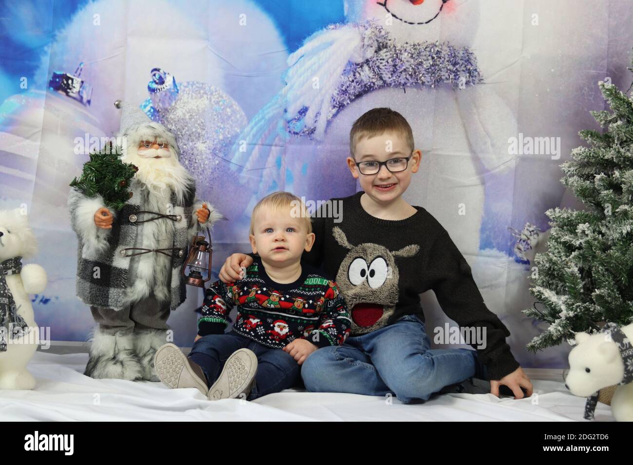 A traditional happy family Christmas photoshoot with a Christmas