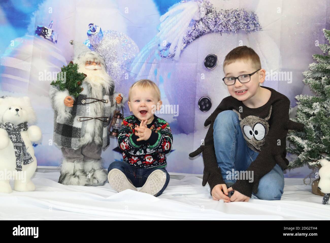 A traditional happy family Christmas photoshoot with a Christmas
