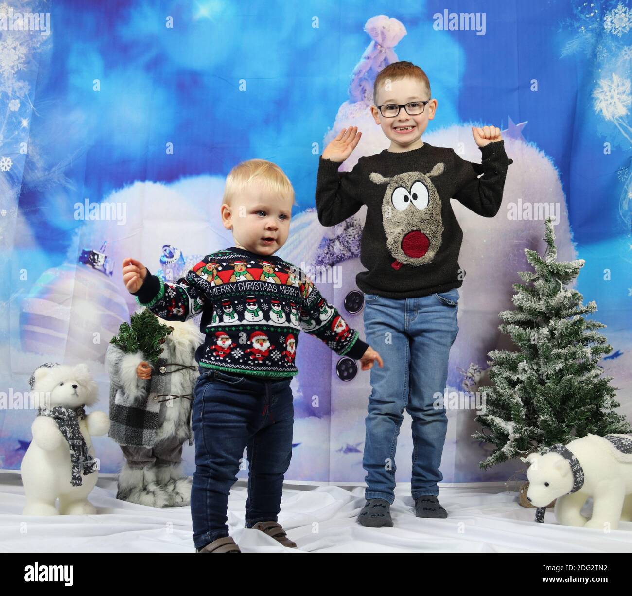 A traditional happy family Christmas photoshoot with a Christmas