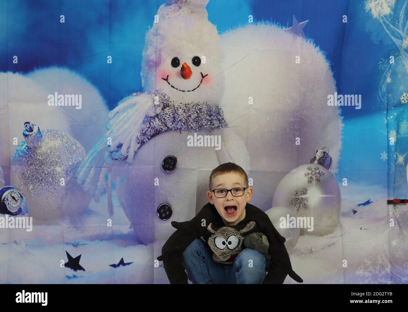 A traditional happy family Christmas photoshoot with a Christmas